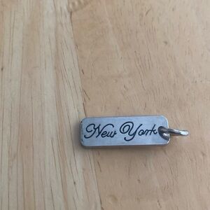 New York silver tone charm. Put on keychain bag charm necklace etc.